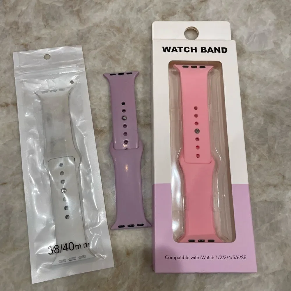 3 Apple Watch bands. Pink white. Purple.